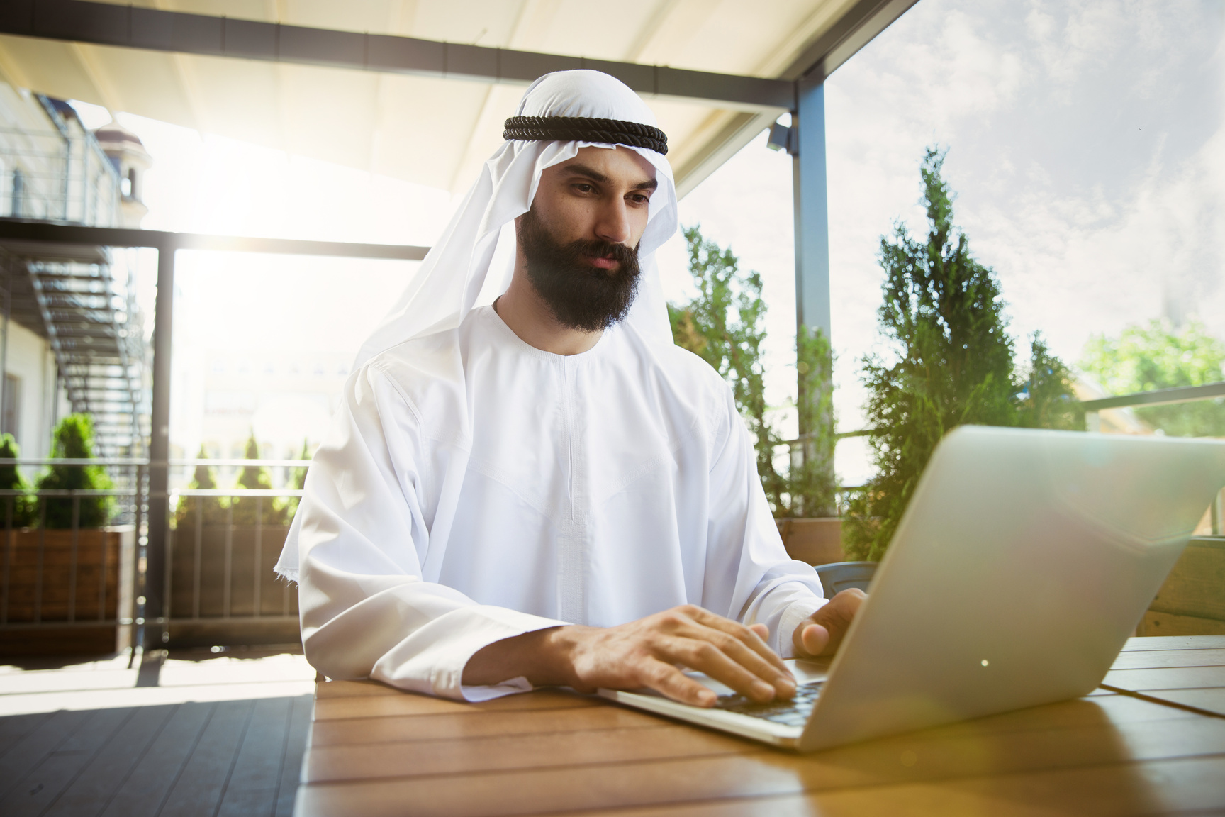 Arabian saudi businessman working outdoors
